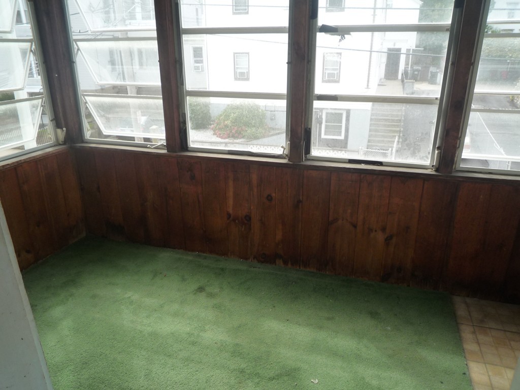 188 Cottage Street Fall River, MA 02721 - Photo 17 of 24 a view of an empty room with a window