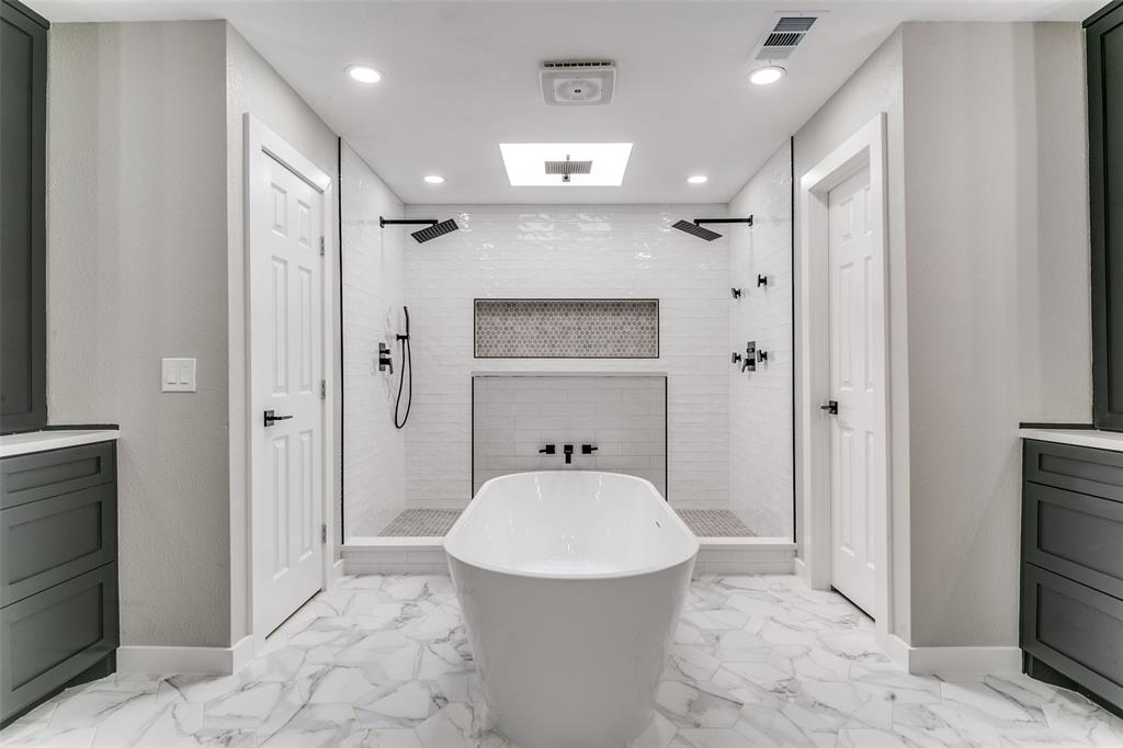 3913 Bobbin Lane Addison, TX 75001 - Photo 17 of 23 Full bathroom featuring vanity, a walk in shower, a freestanding bath, and recessed lighting