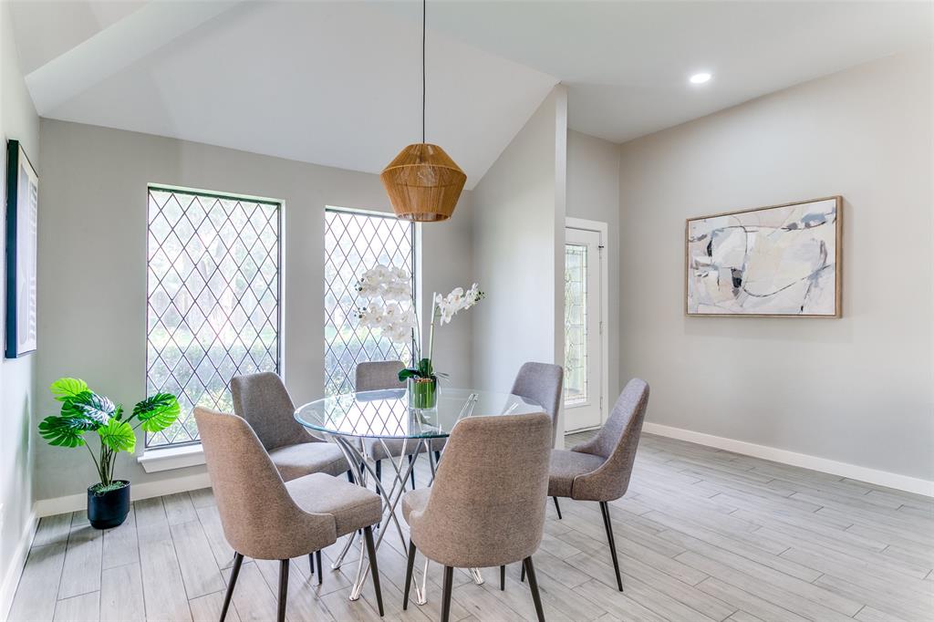3913 Bobbin Lane Addison, TX 75001 - Photo 3 of 23 Dining area with light wood-type flooring, lofted ceiling, and recessed lighting