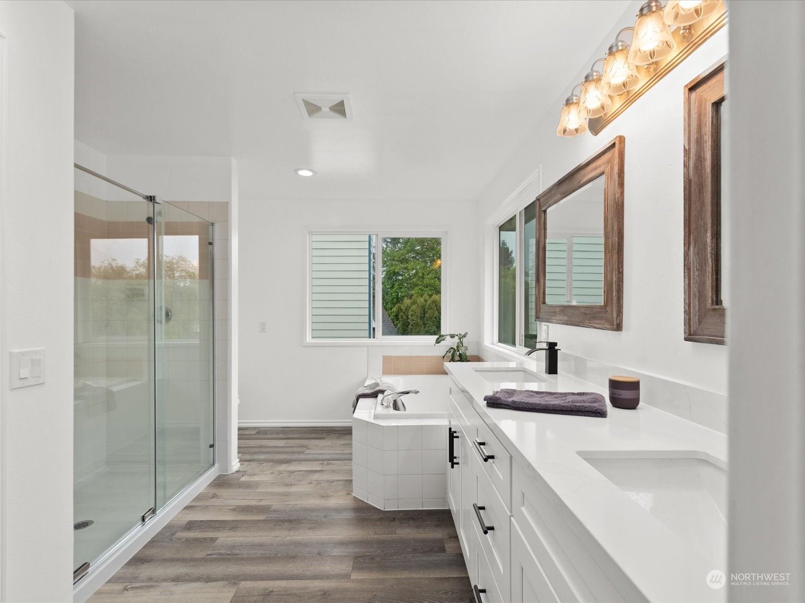 22626 8th Drive Southeast Bothell, WA 98021 - Photo 18 of 39 a bathroom with a double vanity sink window and shower