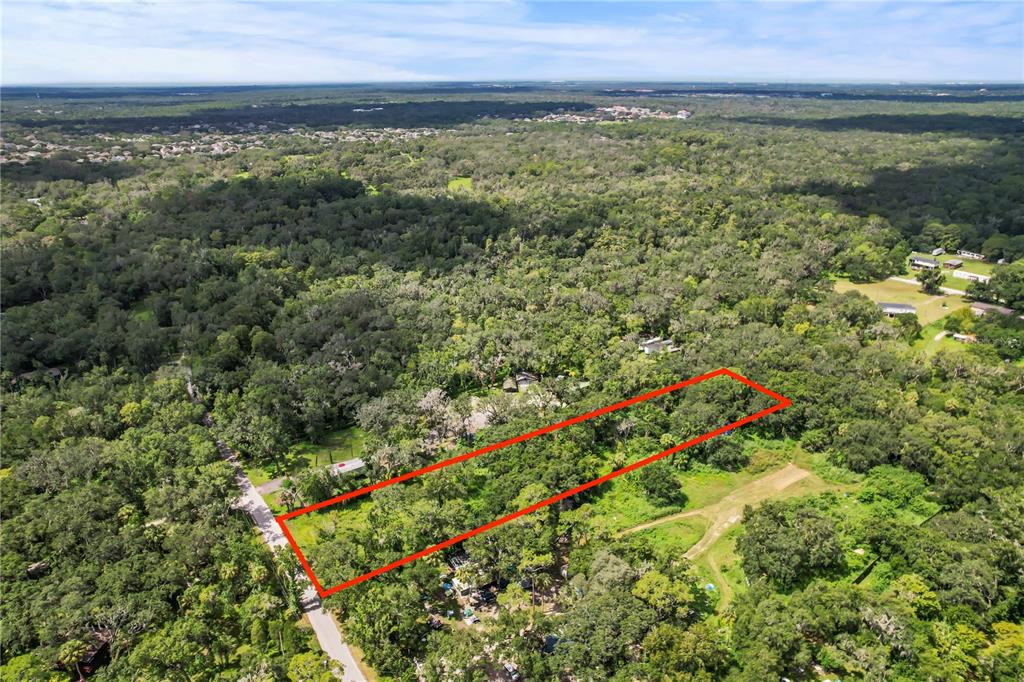 a view of an outdoor space with a lake view