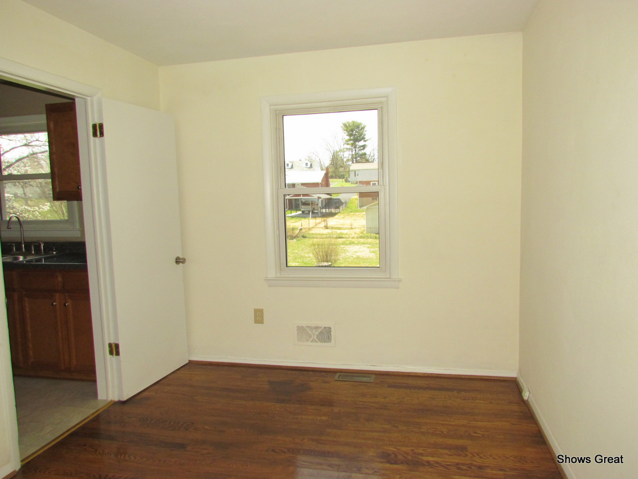 4944 Florist Road Roanoke, VA 24012 - Photo 12 of 20 an empty room with wooden floor and windows