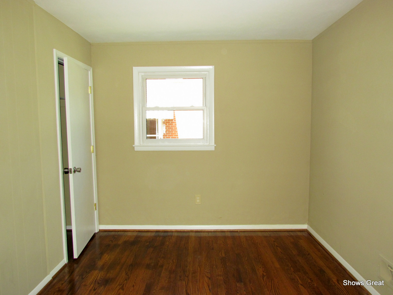 4944 Florist Road Roanoke, VA 24012 - Photo 14 of 20 an empty room with wooden floor and a window