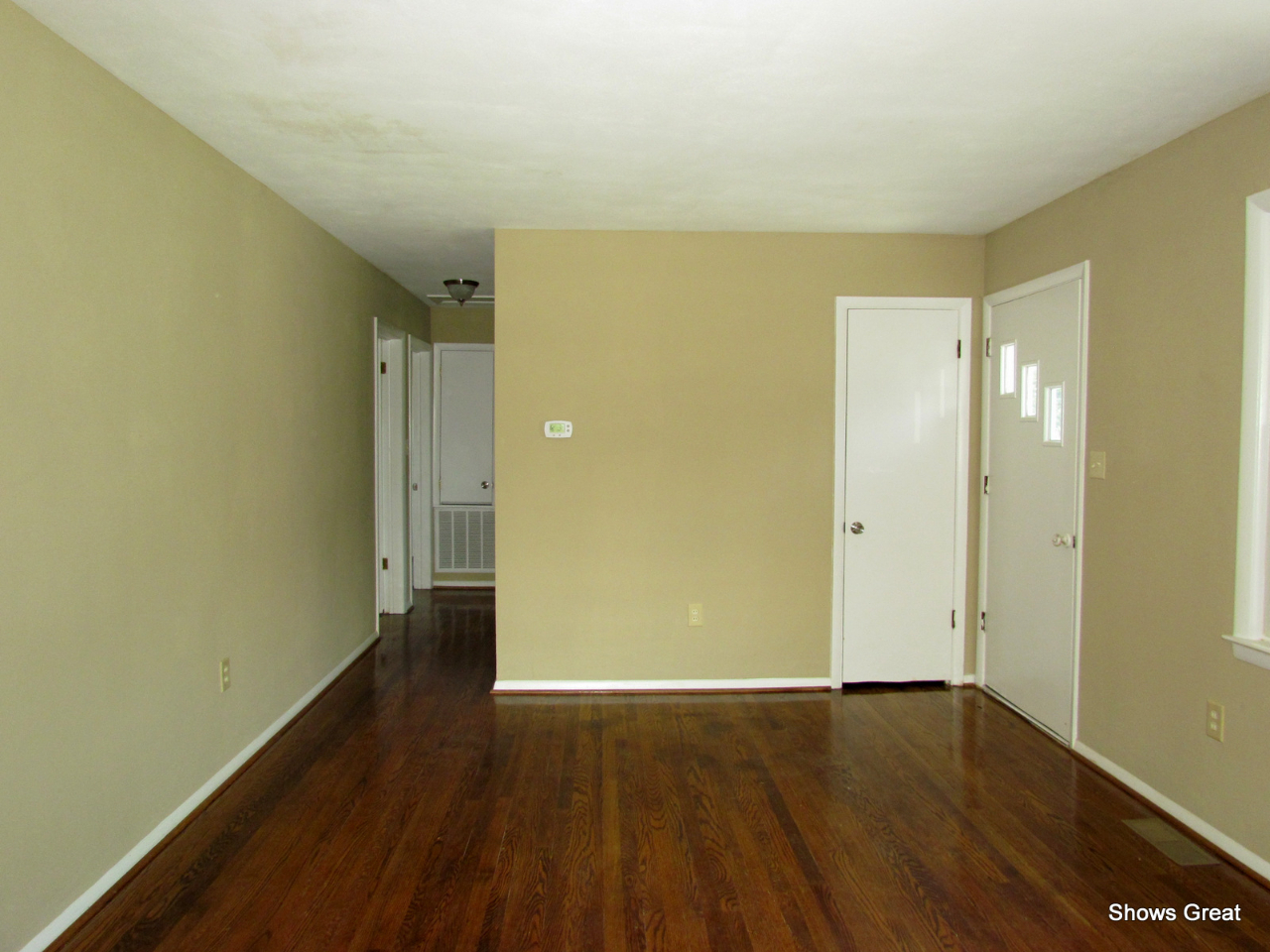 4944 Florist Road Roanoke, VA 24012 - Photo 6 of 20 an empty room with wooden floor and windows