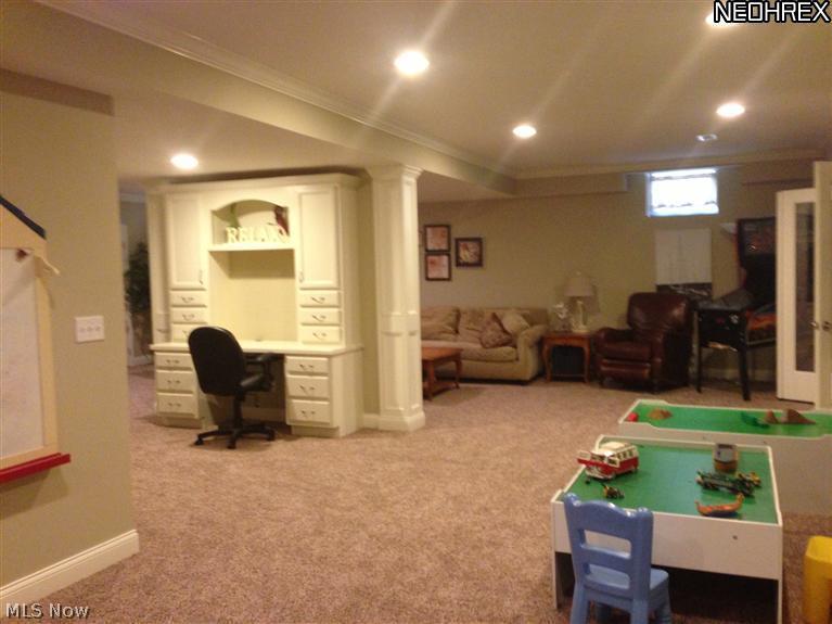 452 Forestview Road Bay Village, OH 44140 - Photo 11 of 24 Built-in desk and plenty of living/playing area in basement