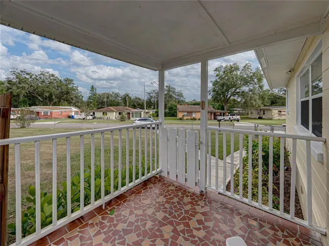 a kitchen with stainless steel appliances granite countertop a stove top oven microwave and cabinets