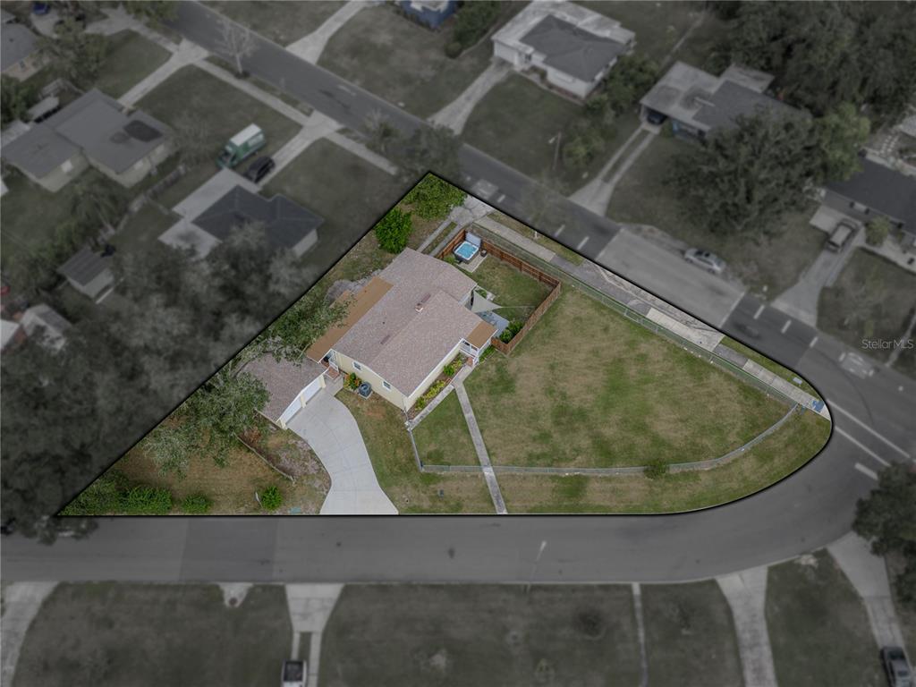 228 Azalea Street Lakeland, FL 33803 - Photo 68 of 80 an aerial view of a house with a yard