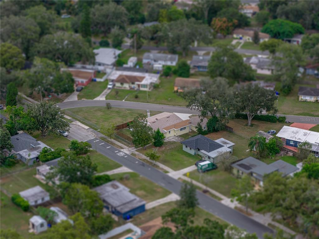 228 Azalea Street Lakeland, FL 33803 - Photo 73 of 80 an aerial view of a house with a garden