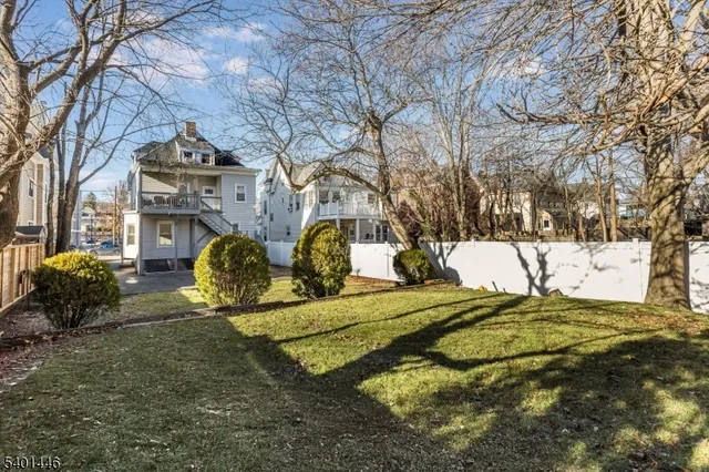 a view of a backyard with a slide