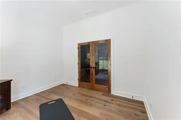 a view of a dining room with furniture and window