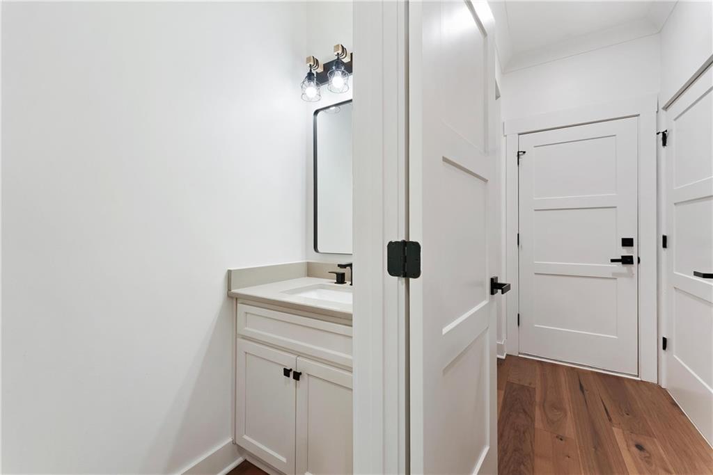 100 Ridge Way Forsyth, GA 31029 - Photo 26 of 99 a bathroom with a sink and a mirror