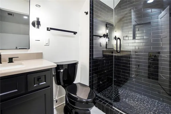 a view of a room with wooden walls