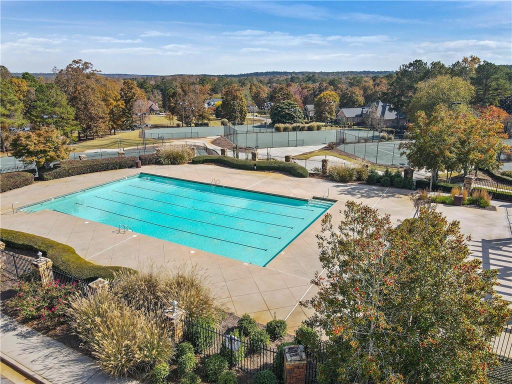 100 Ridge Way Forsyth, GA 31029 - Photo 60 of 99 a view of a swimming pool with an ocean view
