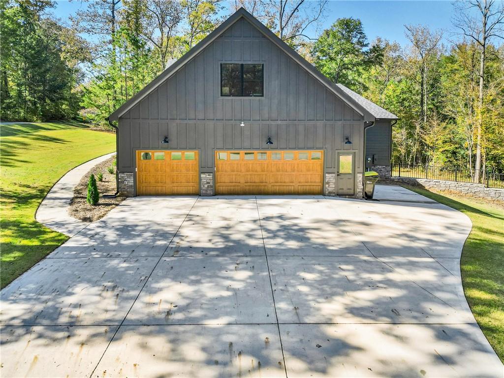 100 Ridge Way Forsyth, GA 31029 - Photo 80 of 99 a view of a house with a patio