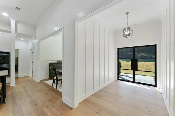 a large kitchen with a large stove and cabinets