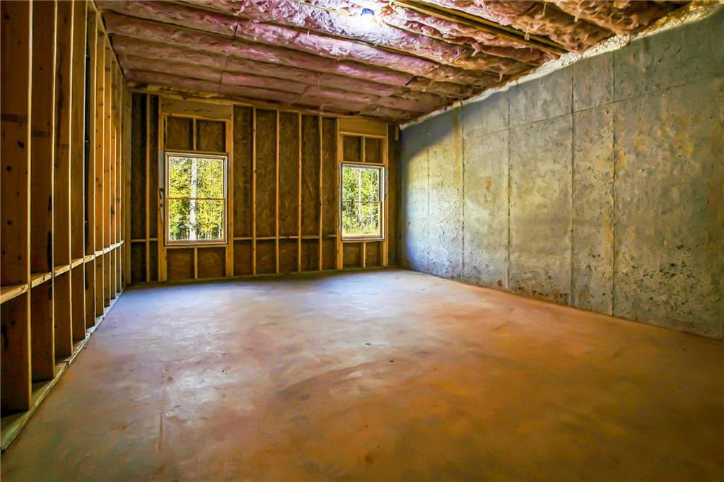 100 Ridge Way Forsyth, GA 31029 - Photo 89 of 99 a view of an empty room with a window
