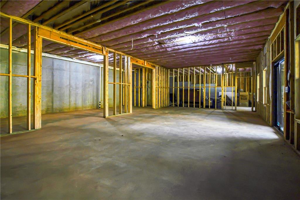 100 Ridge Way Forsyth, GA 31029 - Photo 94 of 99 a view of a room with wooden walls