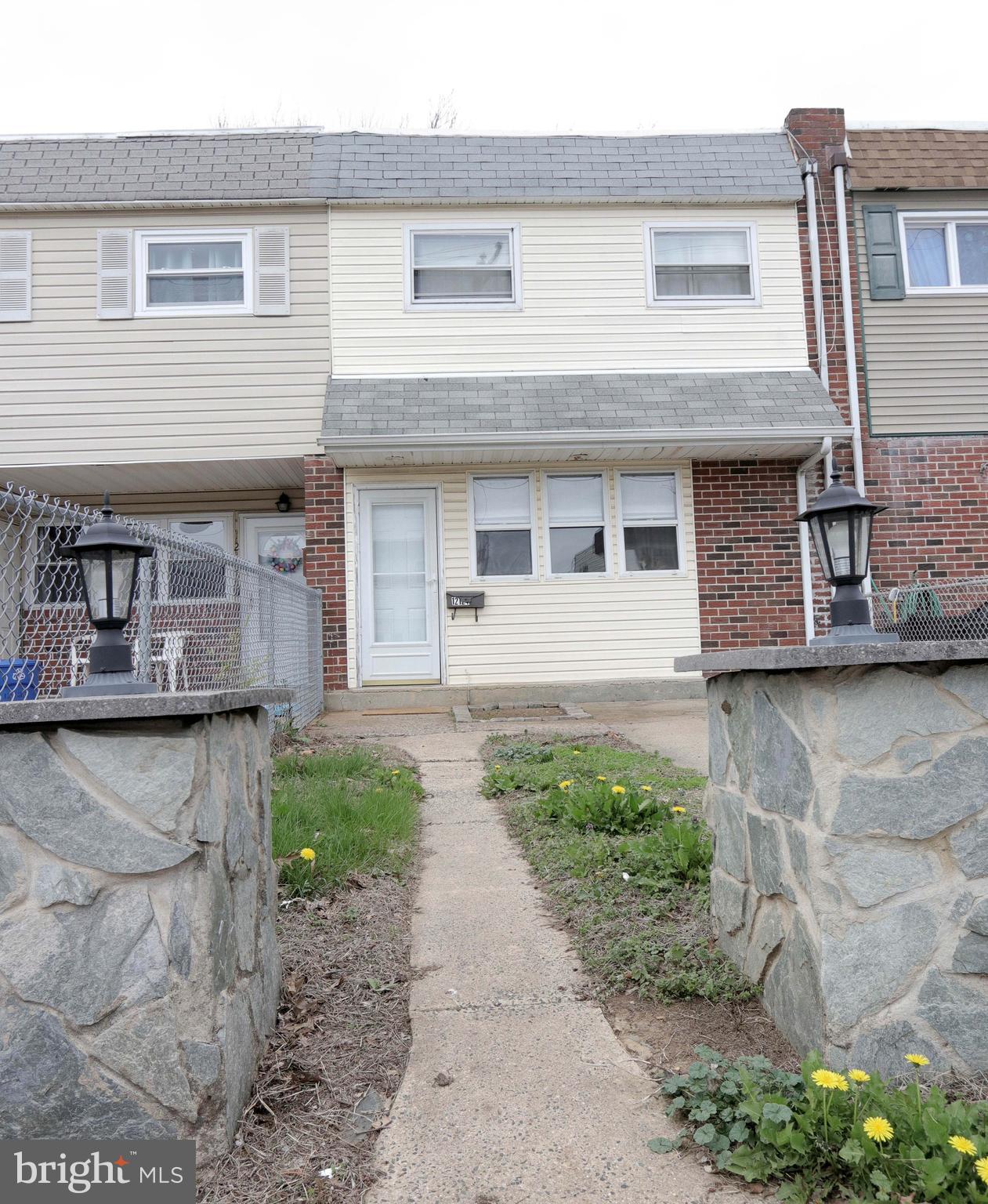 12124 Rambler Road Philadelphia, PA 19154 - Photo 3 of 26 a front view of a house with garden