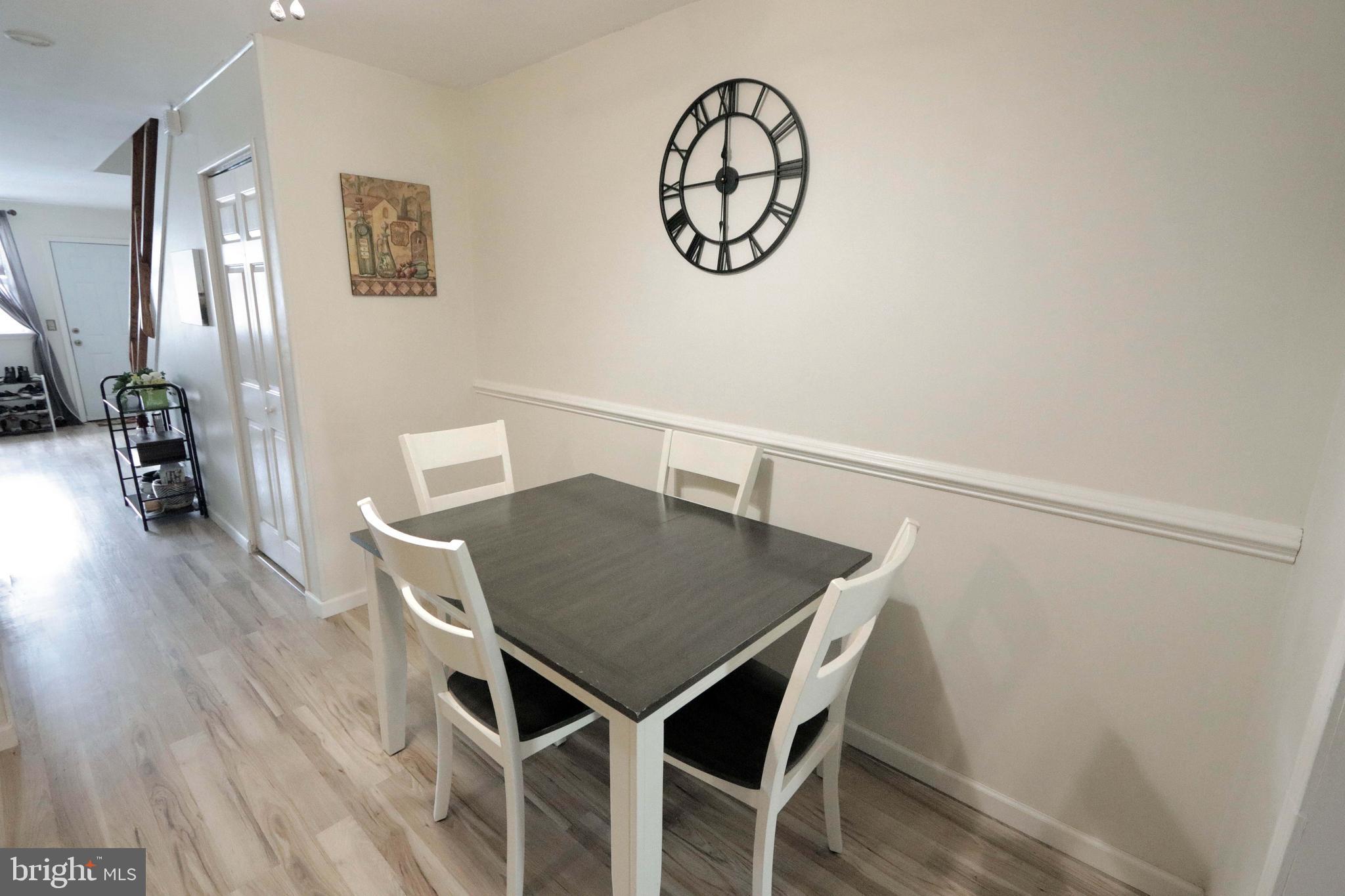 12124 Rambler Road Philadelphia, PA 19154 - Photo 6 of 26 a view of a dining room with furniture and wooden floor