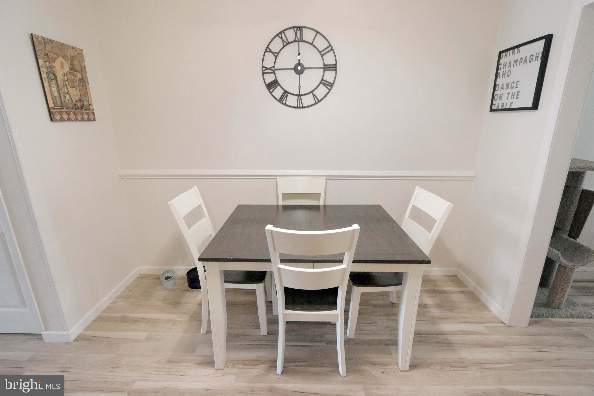 12124 Rambler Road Philadelphia, PA 19154 - Photo 7 of 26 a dining room with furniture and a table