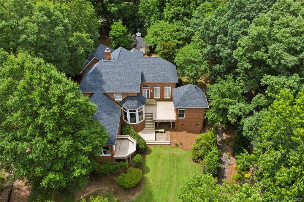 5321 Colony Road Charlotte, NC 28226 - Photo 2 of 29 an aerial view of a house with swimming pool and garden