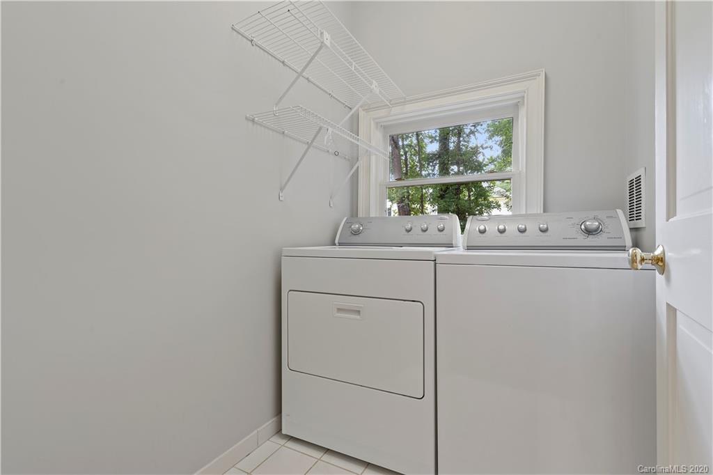 5321 Colony Road Charlotte, NC 28226 - Photo 15 of 29 a room with a sink a window and washer