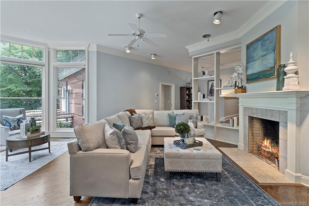 5321 Colony Road Charlotte, NC 28226 - Photo 18 of 29 a living room with furniture and a fireplace