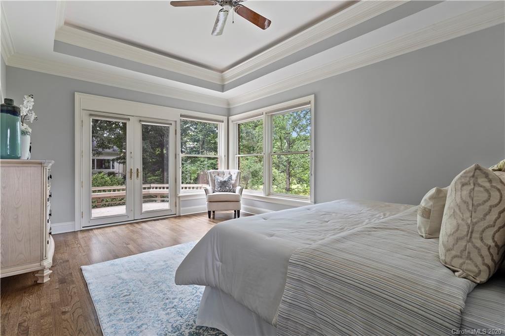 5321 Colony Road Charlotte, NC 28226 - Photo 22 of 29 a bed sitting in a spacious bedroom next to a window
