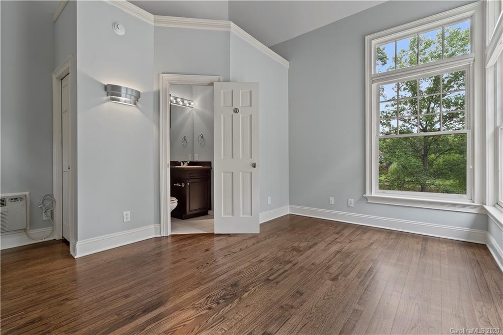 5321 Colony Road Charlotte, NC 28226 - Photo 27 of 29 a view of a big room with wooden floor and windows