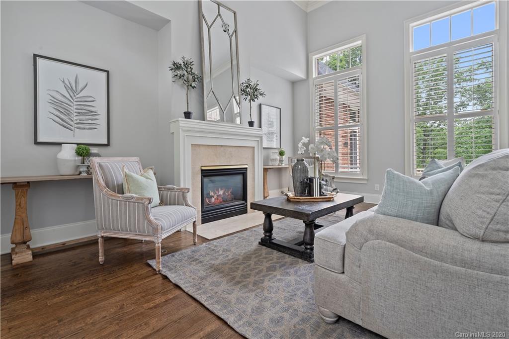 5321 Colony Road Charlotte, NC 28226 - Photo 5 of 29 a living room with furniture and a fireplace
