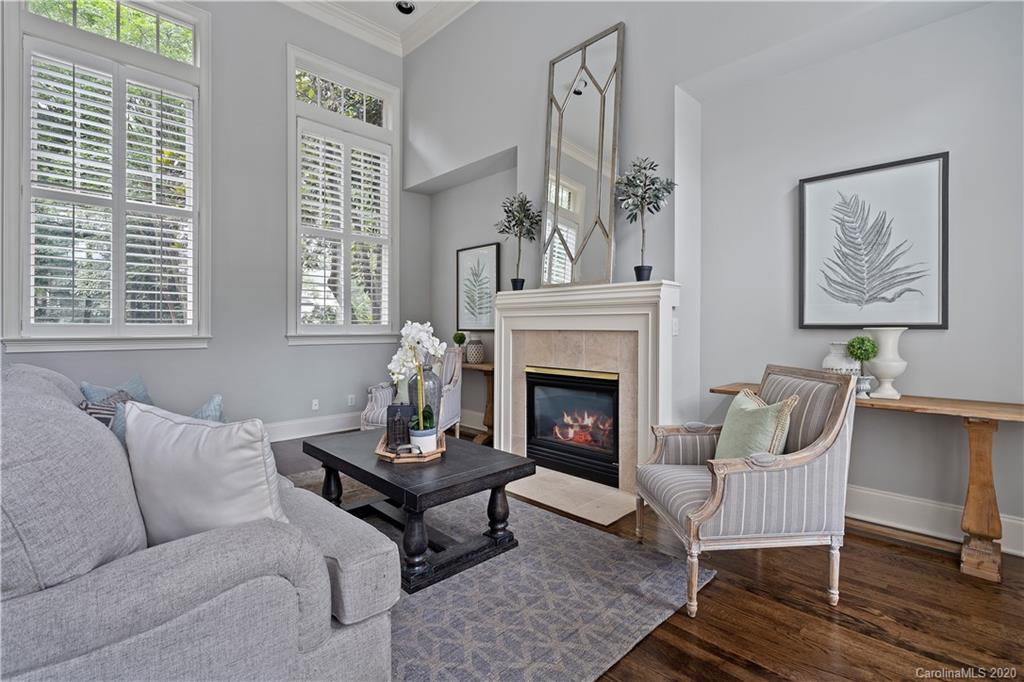5321 Colony Road Charlotte, NC 28226 - Photo 7 of 29 a living room with furniture and a fireplace