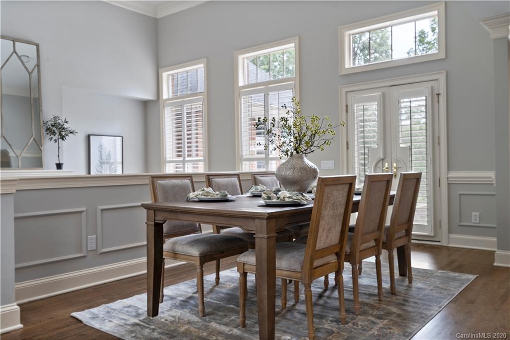 5321 Colony Road Charlotte, NC 28226 - Photo 8 of 29 a view of a a dining room with furniture window and wooden floor