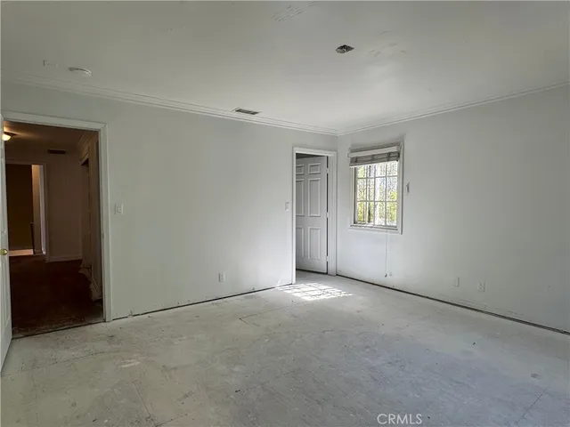 an empty room with windows