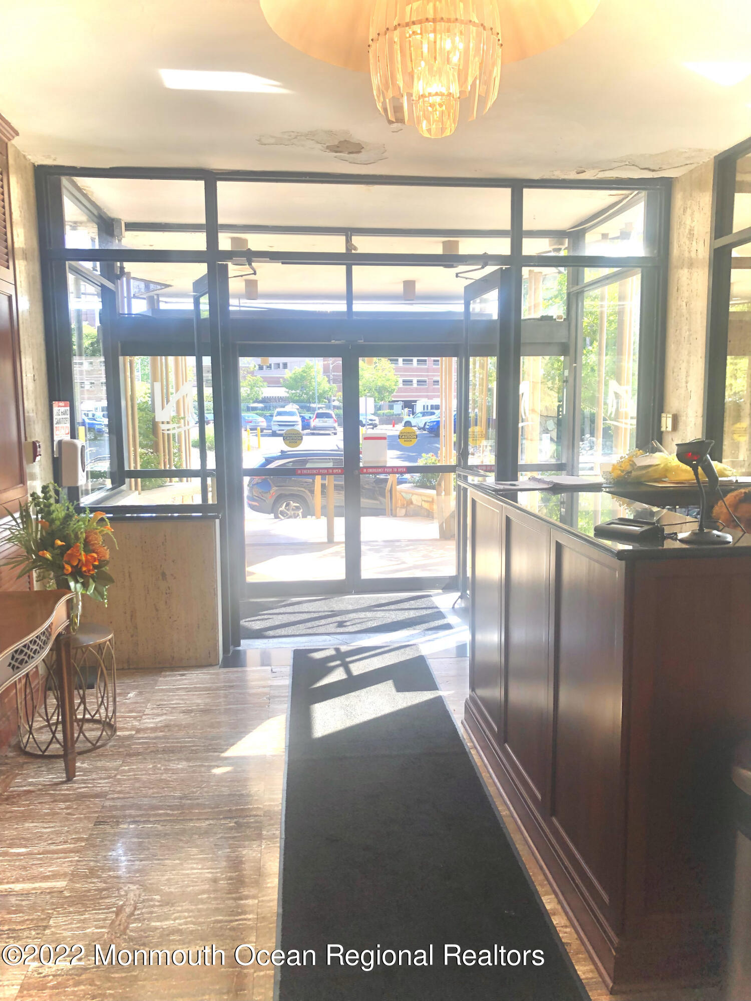 28 Riverside Avenue, Unit 6H Red Bank, NJ 07701 - Photo 4 of 16 Doorman/Entrance