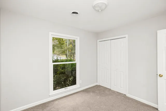 an empty room with windows