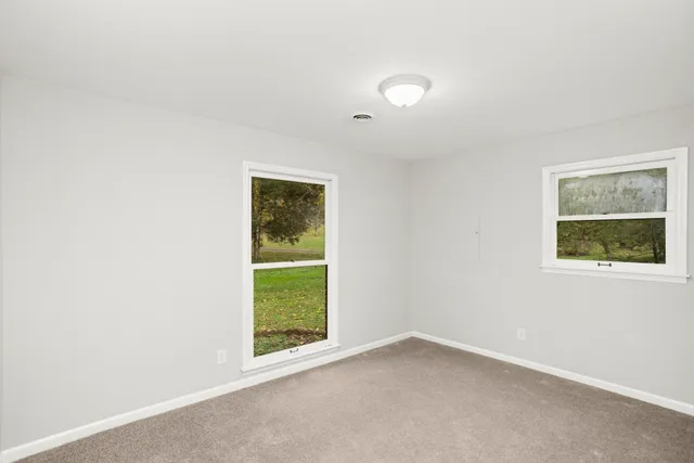 an empty room with window