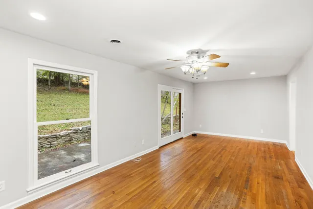 a view of an empty room and window