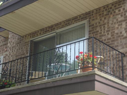 69 Lincoln Avenue, Unit 4 Riverside, IL 60546 - Photo 2 of 10 a view of a balcony with flower plants