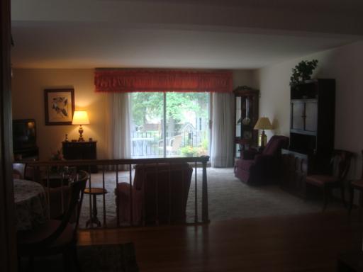69 Lincoln Avenue, Unit 4 Riverside, IL 60546 - Photo 10 of 10 a living room with furniture and a large window