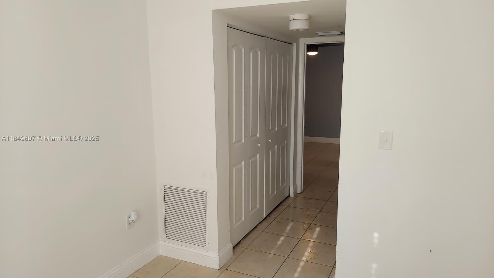15231 Southwest 80th Street, Unit 209 Miami, FL 33193 - Photo 11 of 21 a view of a hallway