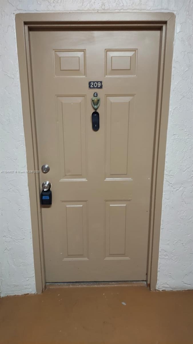 15231 Southwest 80th Street, Unit 209 Miami, FL 33193 - Photo 12 of 21 a view of door