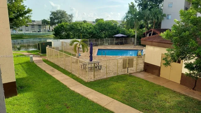 a view of a deck with a yard