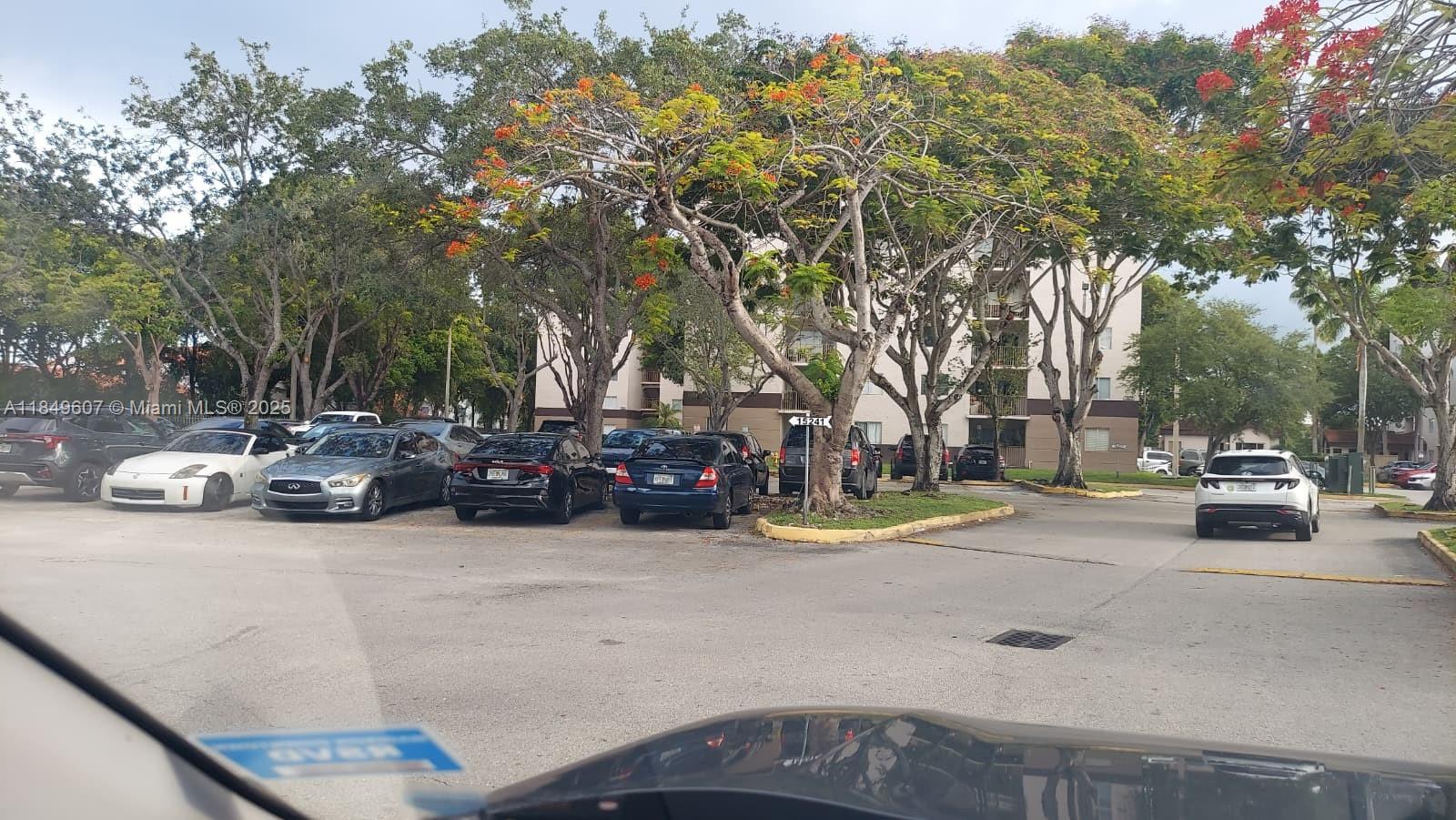 15231 Southwest 80th Street, Unit 209 Miami, FL 33193 - Photo 21 of 21 a view of a street with cars