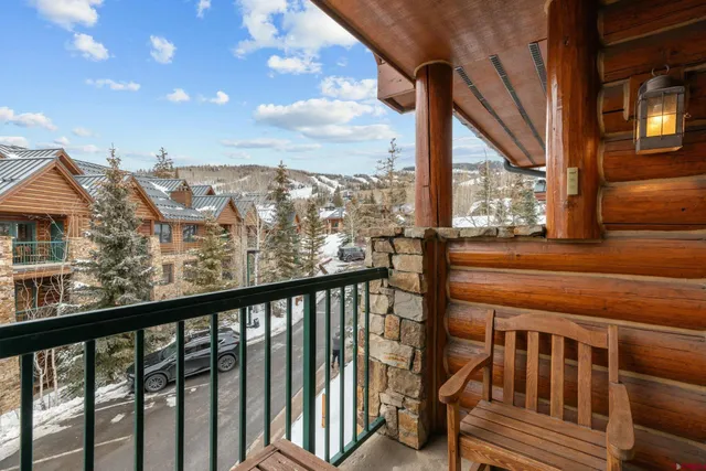 a view of a balcony with city view