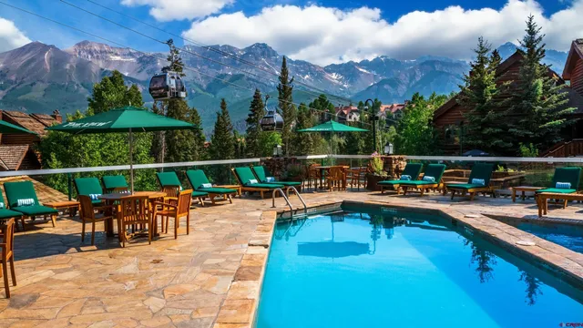 a room with gym equipment and a large window