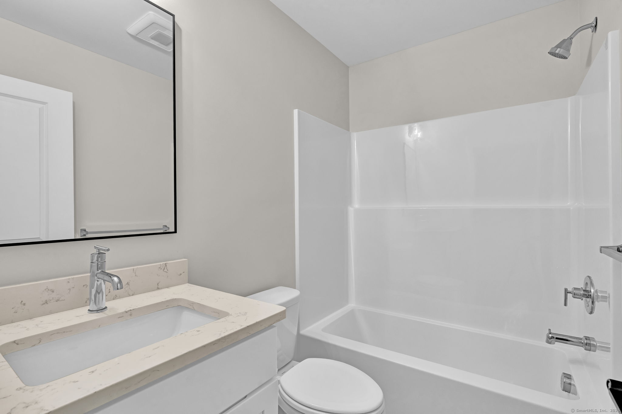 70 Whiting Street, Unit D Plainville, CT 06062 - Photo 15 of 26 a bathroom with a sink toilet and shower