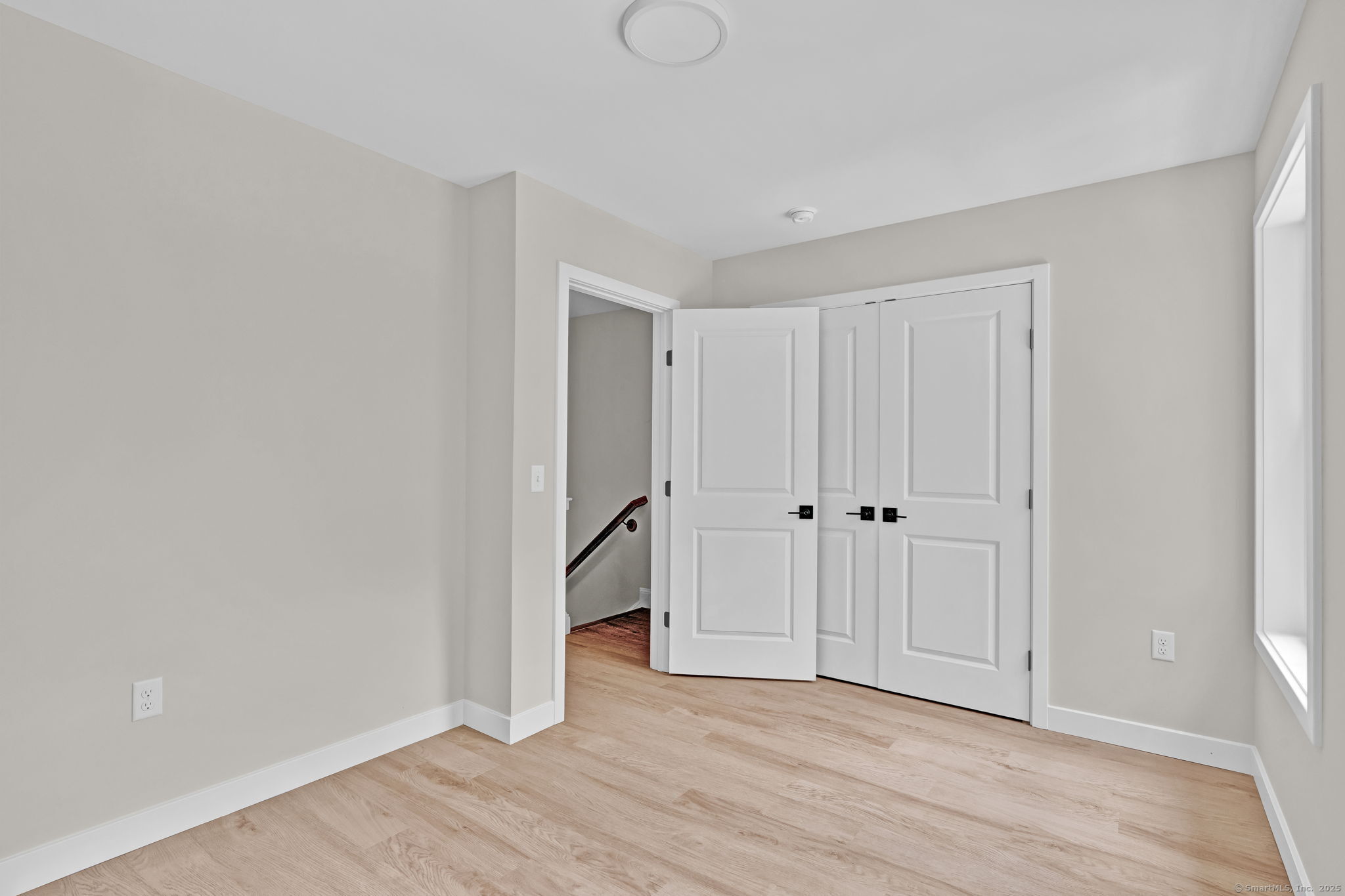 70 Whiting Street, Unit D Plainville, CT 06062 - Photo 17 of 26 a view of an empty room