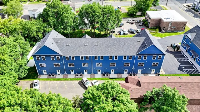 a view of swimming pool with sitting area