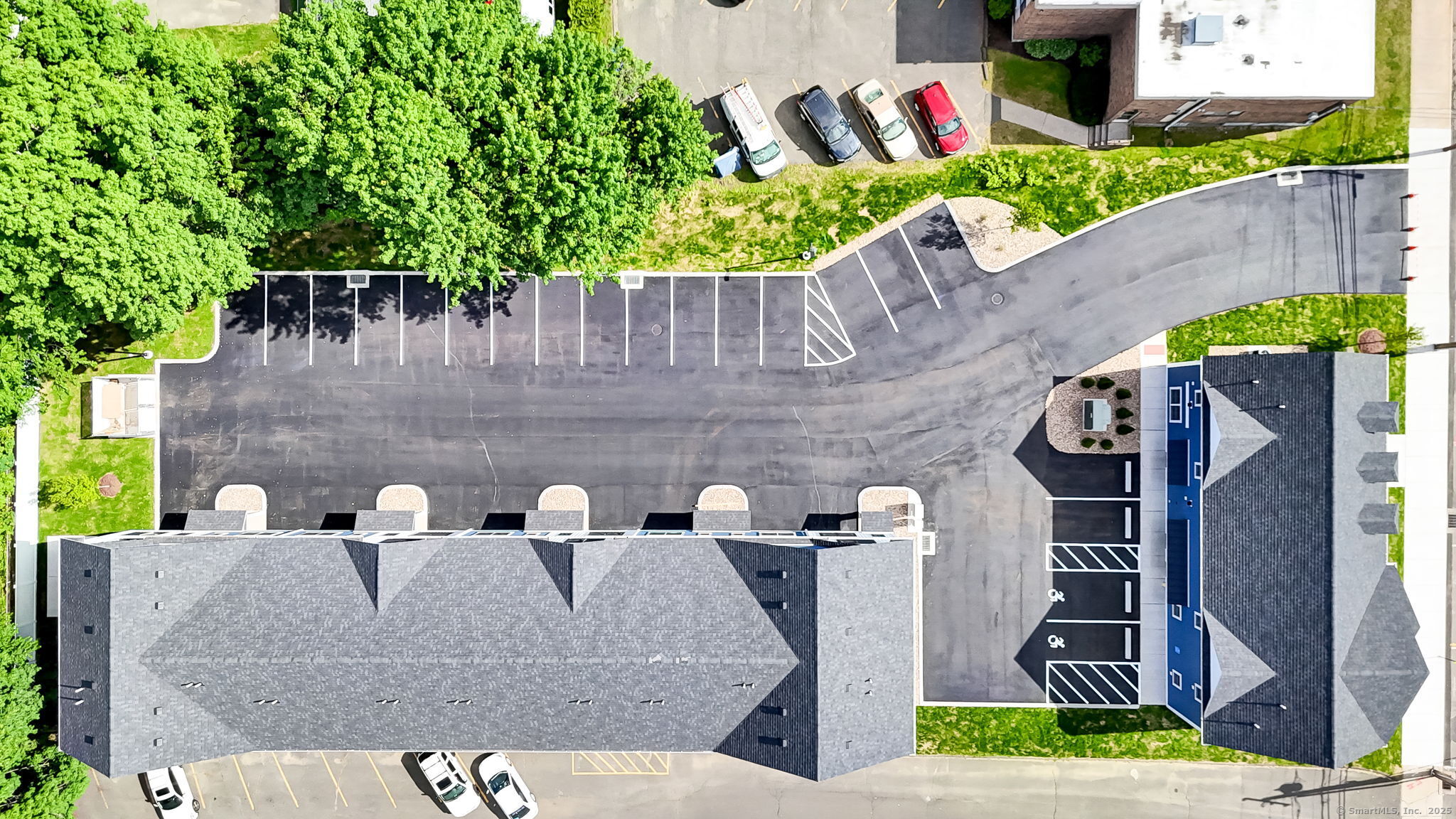 70 Whiting Street, Unit D Plainville, CT 06062 - Photo 25 of 26 a front view of a house with garden