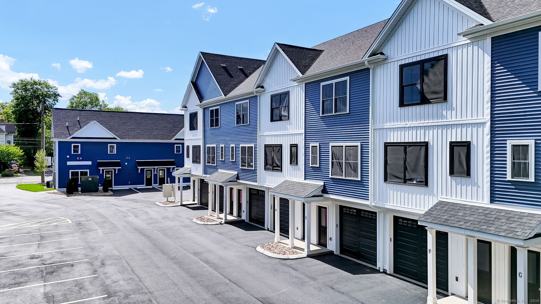 70 Whiting Street, Unit D Plainville, CT 06062 - Photo 26 of 26 a view of a building with sitting area